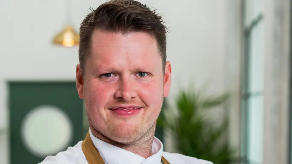 Top chef shares tips through cookbook